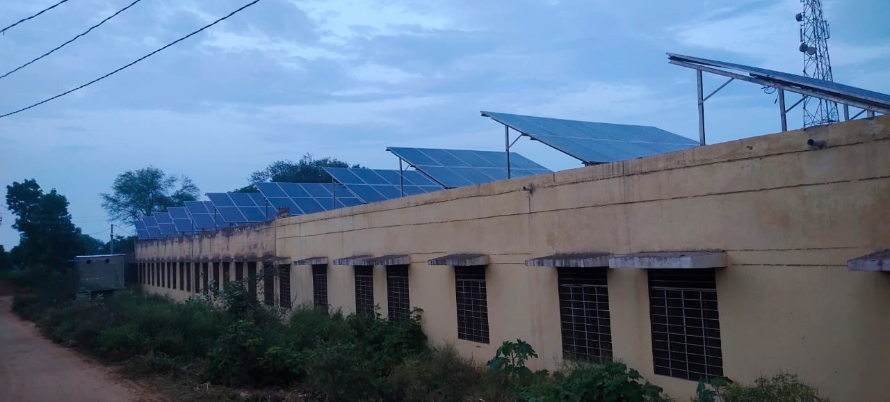 Solar panels affixed to a rooftop in India
