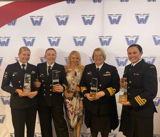 From left to right: POETSM Sara Clarke, LCDR Victoria Jnitova, LCDR Cerys Joyce, RADM Wendy Malcolm and CMDR Penelope Twemlow.