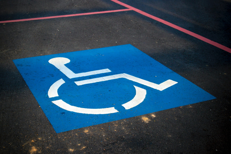 Handicapped symbol on disabled parking lot