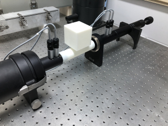 Optical image of acoustic devices and setting up for experimental measurement.