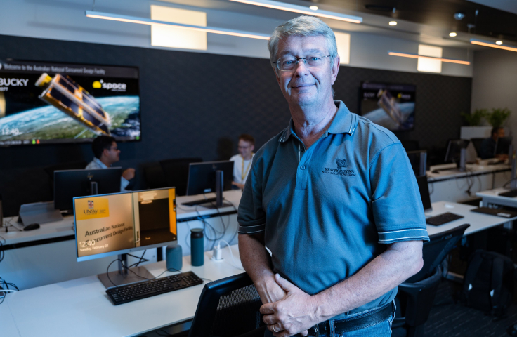Professor Ed Kruzins standing in UNSW Canberra Space facility. 